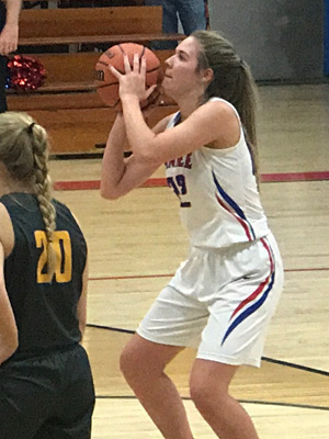 Hanna Adcock playing basketball